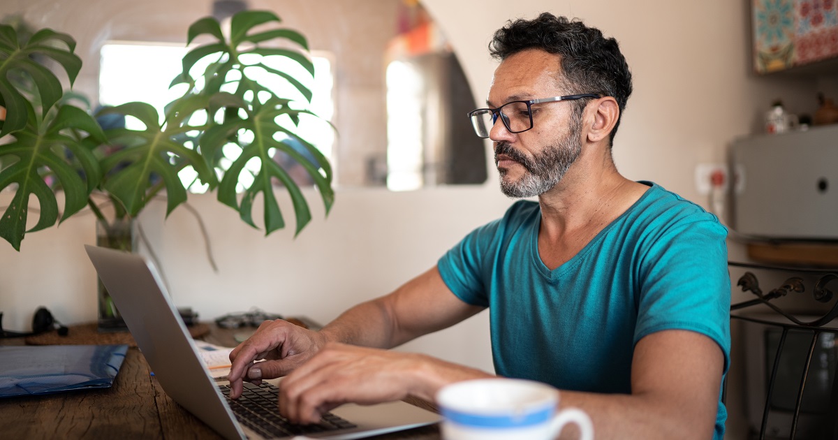 Man working in insurance knowledge database